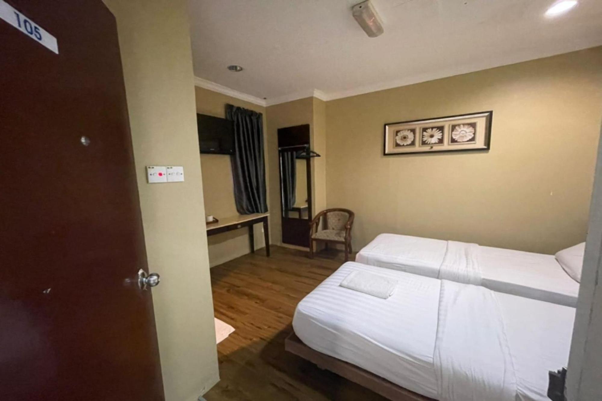Oyo 90411 Perdana Hotel Лабуан Экстерьер фото